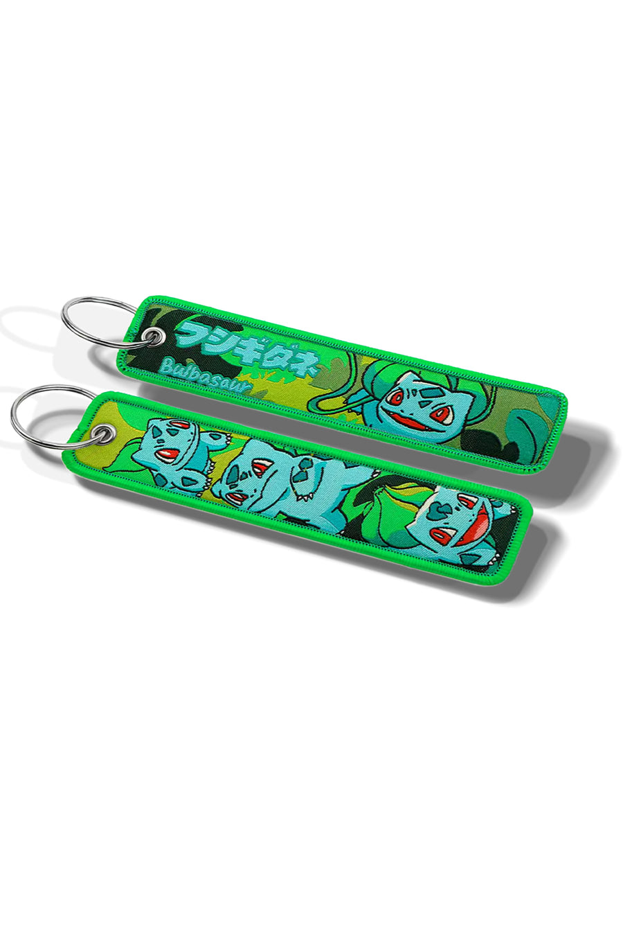 Two colorful keychains with cartoon characters on a white background