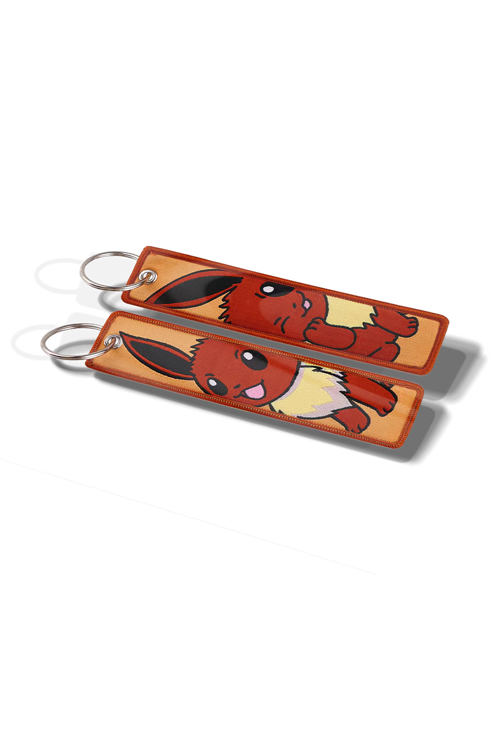 Eve Flight tag sat on some luxury leather while attacthed to a Nissan GTR R35 key