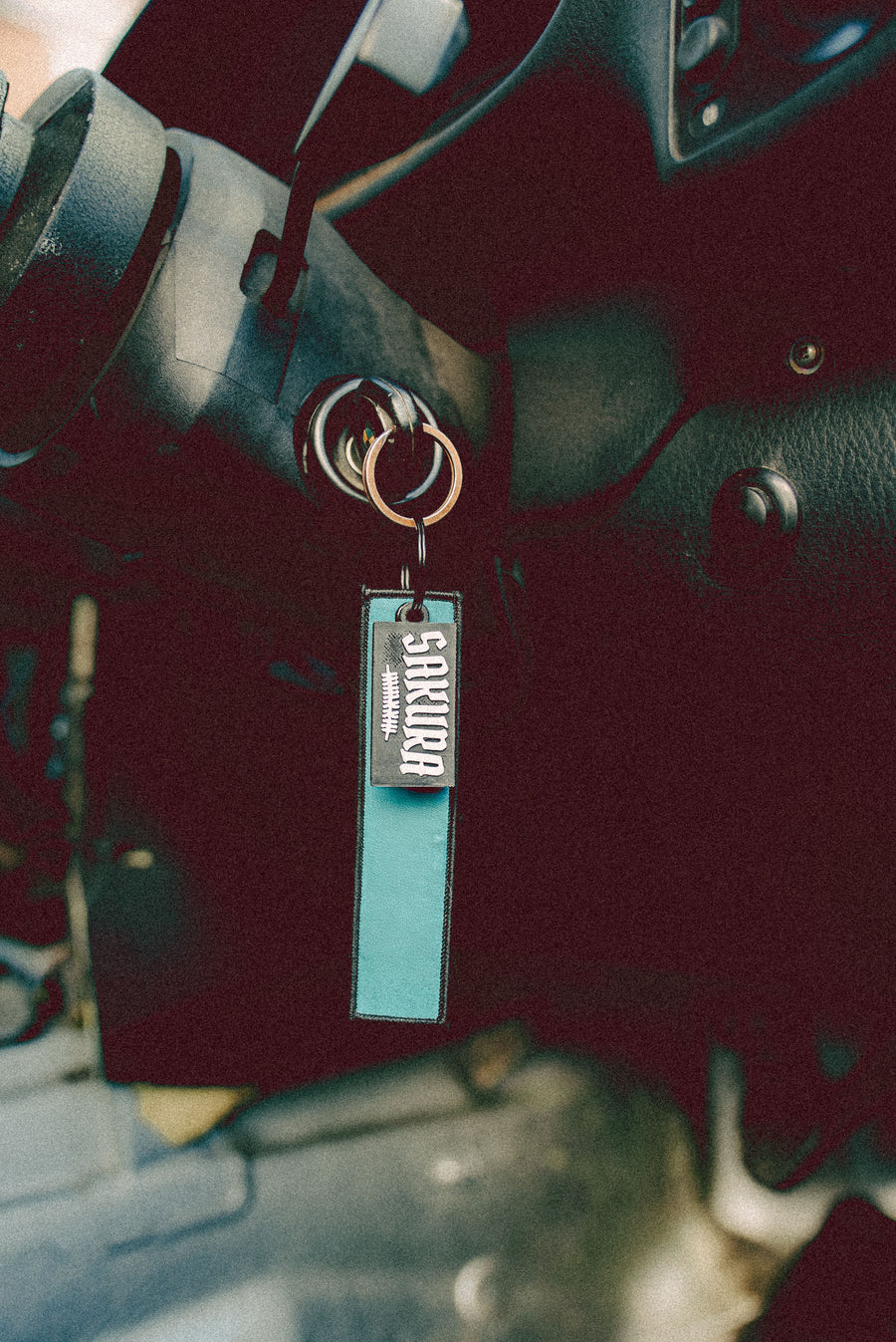 sakura key chain hanging on some bmw keys